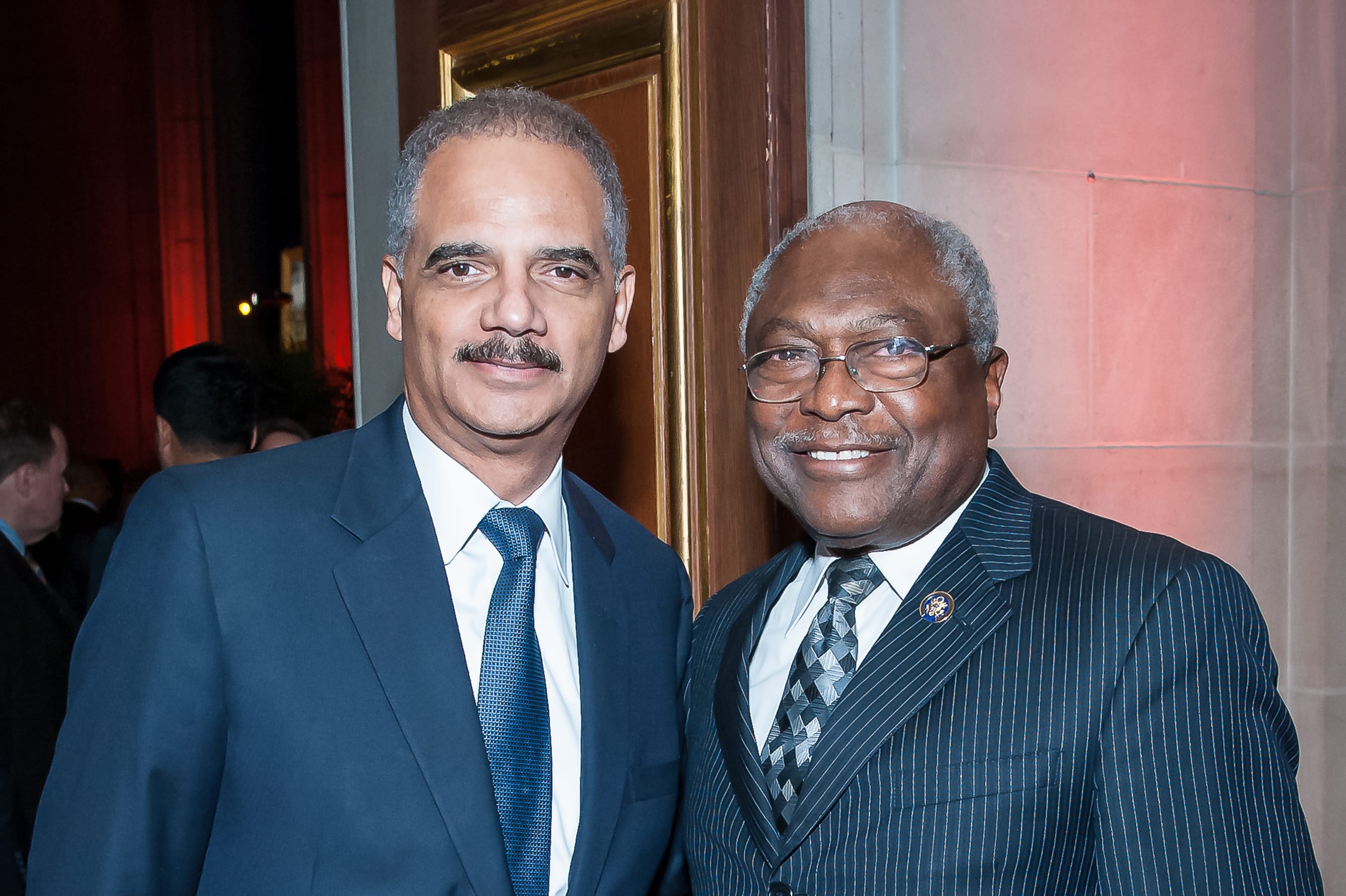 L-R: Former Attorney General Eric Holder and Congressman James Clyburn. Photo by Tony Powell, 2015.